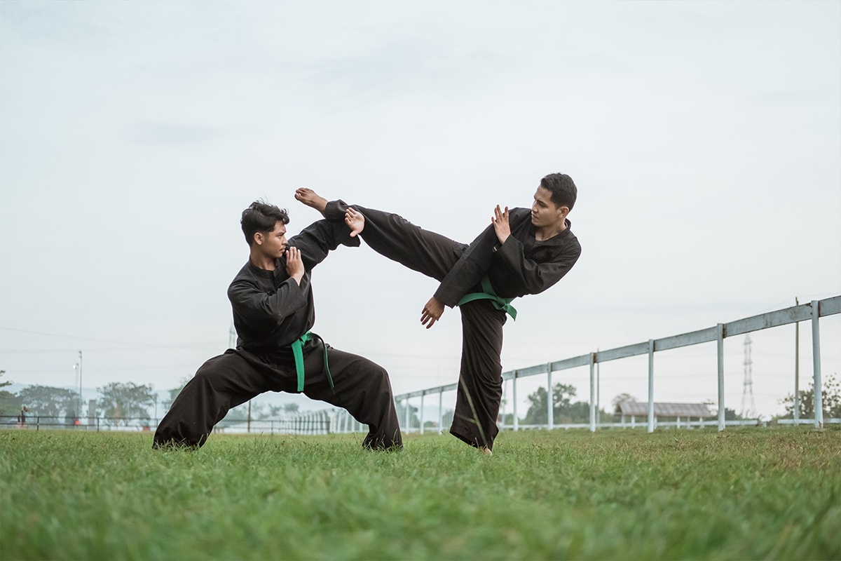 two men practicing Pencak Silat